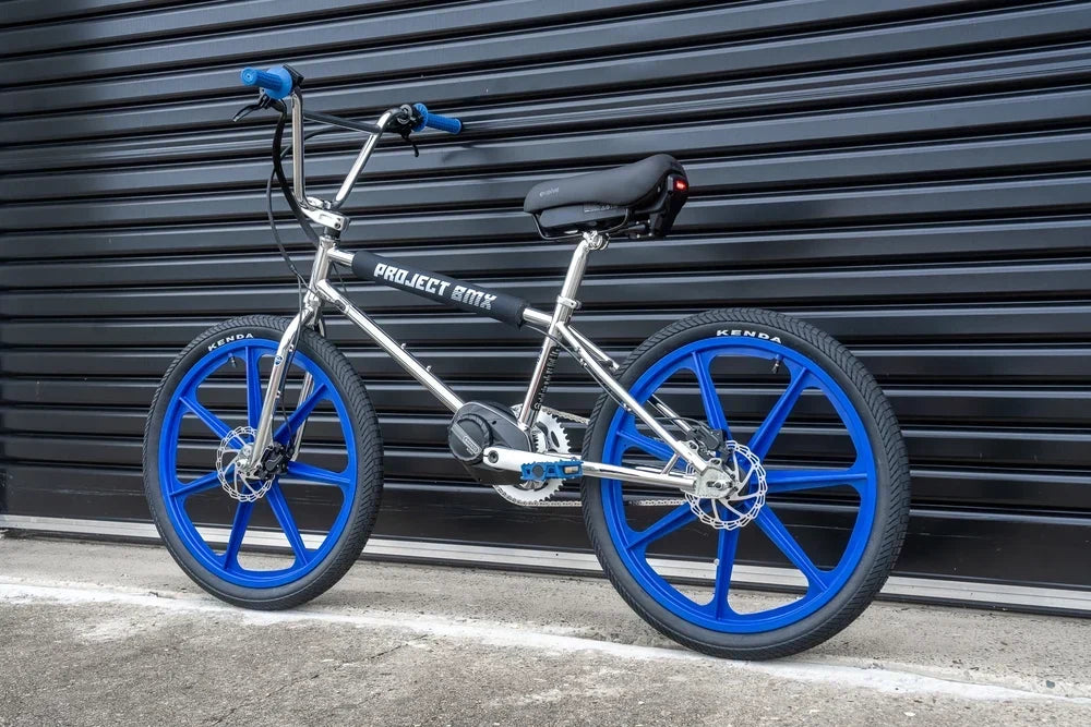 Image showing Evolve Project BMX chrome frame with blue tuff wheels