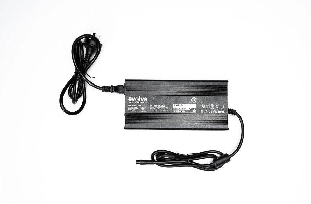 Evolve Skateboards battery charger for electric skateboards, black compact design with power cord